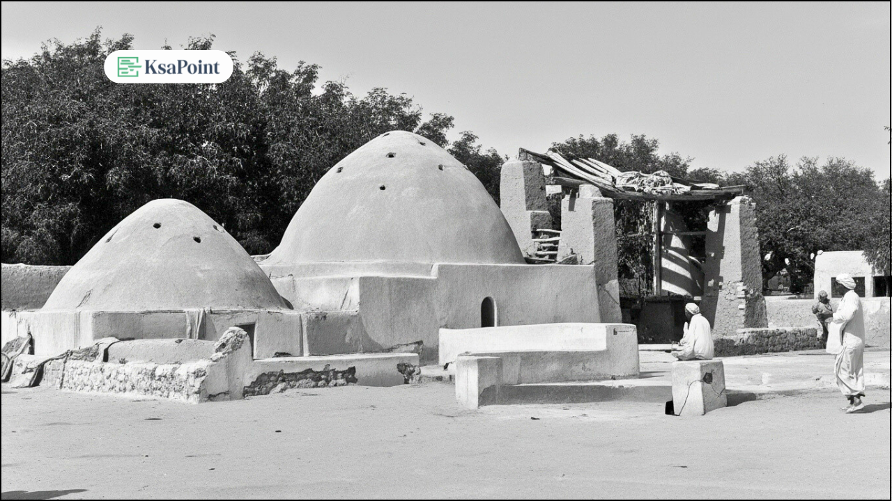 Historical black and white photo of Najm Spring in al-Ahsa showing original dome structures