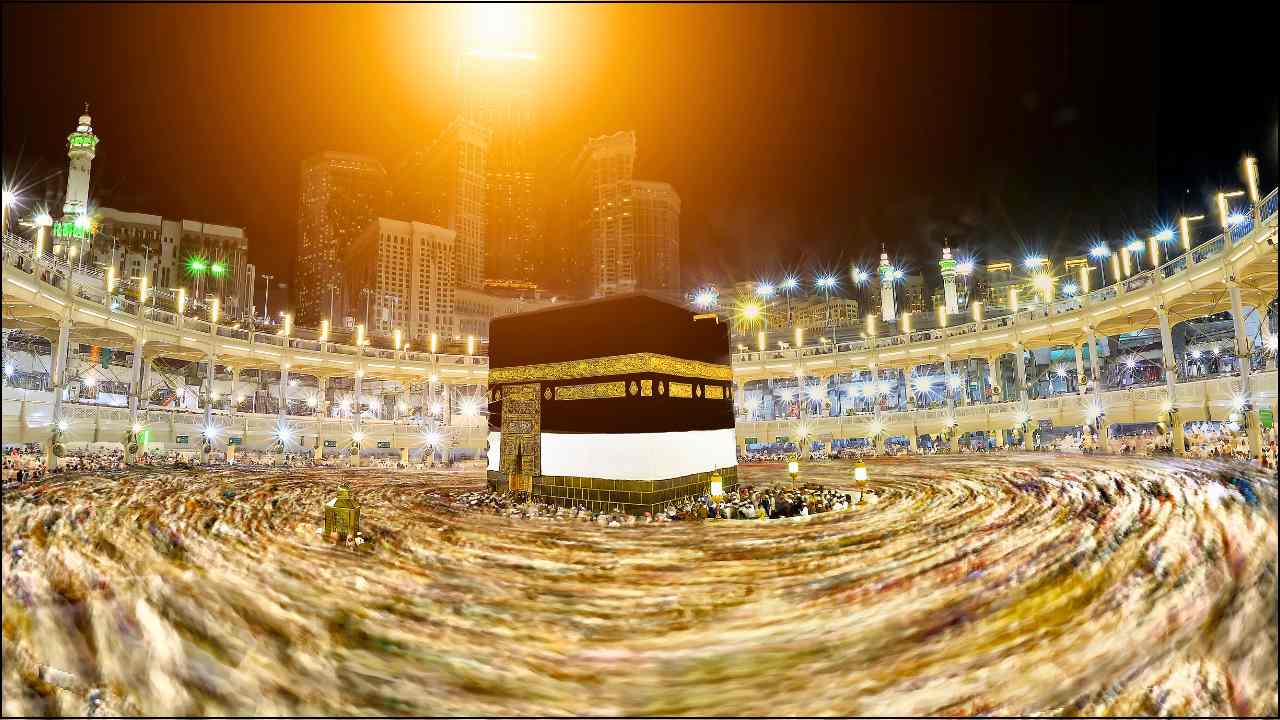 Masjid Al Haram in Makkah with Kaaba showing pilgrims performing Tawaf.
